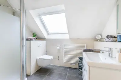 Ein Badezimmer in der Unterkunft Ferienwohnungen Pellenzblick - Wohnen auf Zeit -