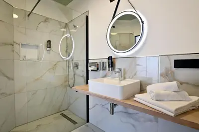 Ein Badezimmer in der Unterkunft Hotel Zehnthof