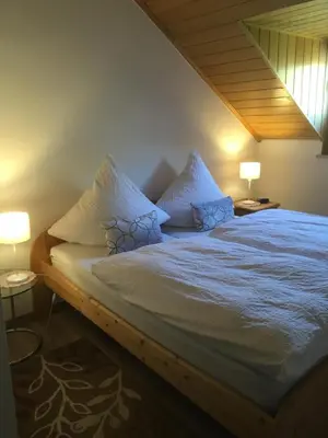 Ein Bett oder Betten in einem Zimmer der Unterkunft Haus Mosella