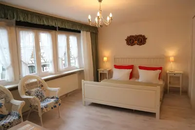 Ein Bett oder Betten in einem Zimmer der Unterkunft Winzerhäuschen am Brunnen