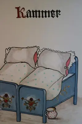 Ein Bett oder Betten in einem Zimmer der Unterkunft Winzerhäuschen am Brunnen