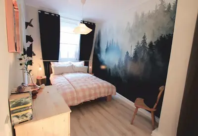 Ein Bett oder Betten in einem Zimmer der Unterkunft FerienNest Haus Braunfels