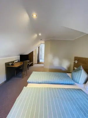 Ein Bett oder Betten in einem Zimmer der Unterkunft Weinbergs Loge