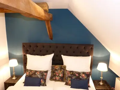 Ein Bett oder Betten in einem Zimmer der Unterkunft LindenOne