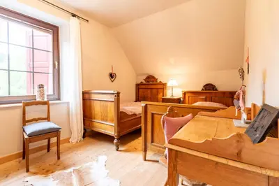 Ein Bett oder Betten in einem Zimmer der Unterkunft Landhaus Camillas Höhe