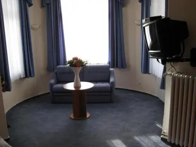 Ein Sitzbereich in der Unterkunft Golfhotel Denzerheide