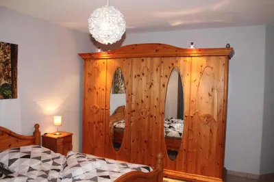 Ein Bett oder Betten in einem Zimmer der Unterkunft Ferienwohnung 