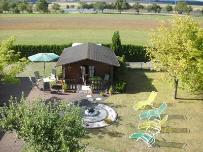 Ein Garten an der Unterkunft Pension Kölzer