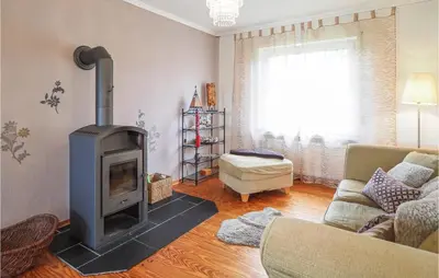 Ein Sitzbereich in der Unterkunft 3 Bedroom Nice Apartment In Grenderich