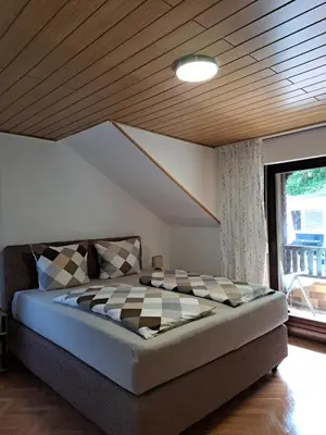 Ein Bett oder Betten in einem Zimmer der Unterkunft Haus Grünewald