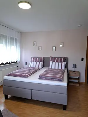Ein Bett oder Betten in einem Zimmer der Unterkunft Haus Grünewald