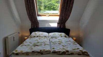 Ein Bett oder Betten in einem Zimmer der Unterkunft Räuberhöhle