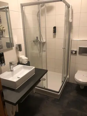Ein Badezimmer in der Unterkunft Hotel am Brünnchen