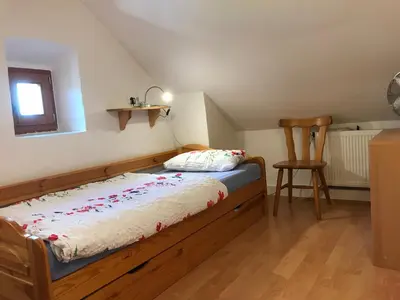 Ein Bett oder Betten in einem Zimmer der Unterkunft Ferienhaus 