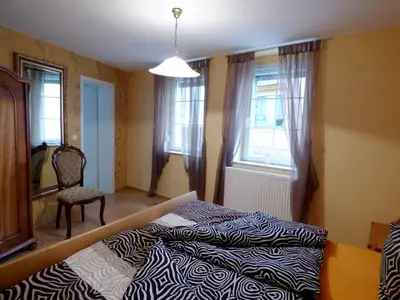 Ein Bett oder Betten in einem Zimmer der Unterkunft Relaxen im alten Winzerhaus Fewo EG