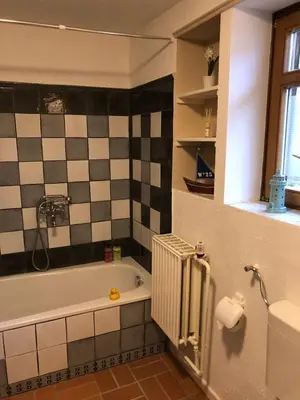 Ein Badezimmer in der Unterkunft Hommes Haus