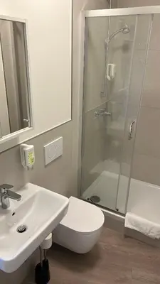 Ein Badezimmer in der Unterkunft Hotel Ohm Patt