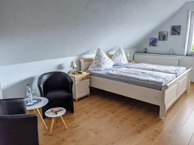 Ein Bett oder Betten in einem Zimmer der Unterkunft Gaestehaus Gaes