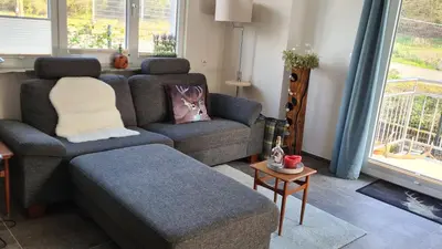 Ein Sitzbereich in der Unterkunft Ferienwohnung Wurzelecht