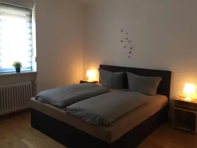 Ein Bett oder Betten in einem Zimmer der Unterkunft Ferienwohnungen Fuhrmann-Burg