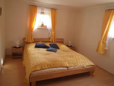 Ein Bett oder Betten in einem Zimmer der Unterkunft Ferienwohnung Barzen
