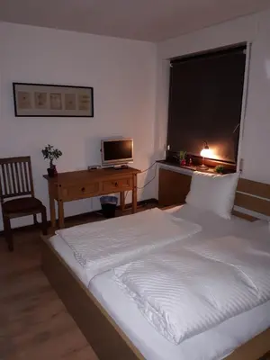 Ein Bett oder Betten in einem Zimmer der Unterkunft Herberg Die alte Schleuse