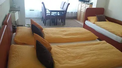 Ein Bett oder Betten in einem Zimmer der Unterkunft Hotel Am Ufer