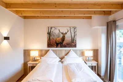 Ein Bett oder Betten in einem Zimmer der Unterkunft Landhotel Ewerts