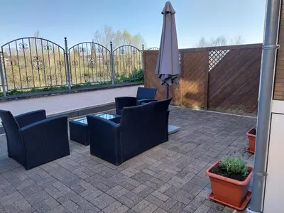 Ein Sitzbereich in der Unterkunft Ferienwohnung Römerbrücke