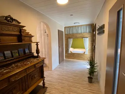 Ein Bett oder Betten in einem Zimmer der Unterkunft Ferienwohnung am Kirchberg