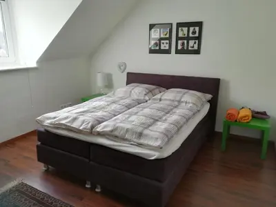 Ein Bett oder Betten in einem Zimmer der Unterkunft Mosel Dream