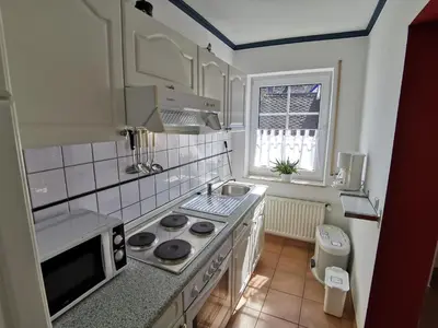 Küche/Küchenzeile in der Unterkunft Apartments / Ferienwohnungen Moseluferstrasse