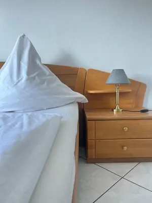 Ein Bett oder Betten in einem Zimmer der Unterkunft Weingut Sauer-Kettermann
