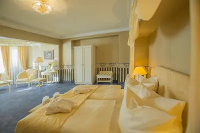 Ein Bett oder Betten in einem Zimmer der Unterkunft Parkhotel Idar-Oberstein
