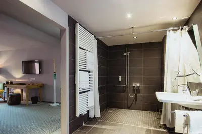 Ein Badezimmer in der Unterkunft Hotel Goldene Traube - by Neugart