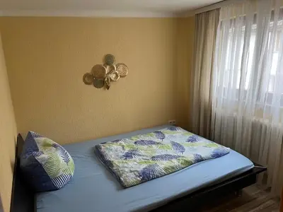 Ein Bett oder Betten in einem Zimmer der Unterkunft Kleine Pearl