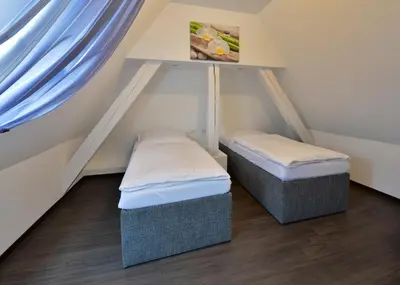 Ein Bett oder Betten in einem Zimmer der Unterkunft Landhaus Elbert