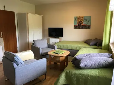 Ein Sitzbereich in der Unterkunft Ferienhaus Munterley