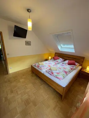 Ein Bett oder Betten in einem Zimmer der Unterkunft Ferienhaus Jobelius