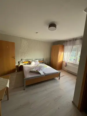 Ein Bett oder Betten in einem Zimmer der Unterkunft Petryhof
