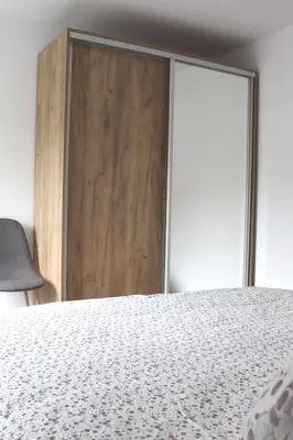Ein Bett oder Betten in einem Zimmer der Unterkunft Winzerhaus Loreley