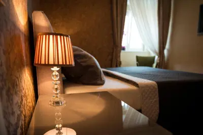 Ein Bett oder Betten in einem Zimmer der Unterkunft Mosel-Suiten