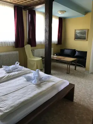 Ein Bett oder Betten in einem Zimmer der Unterkunft Haus Adams - das Wohlfühl Gästehaus