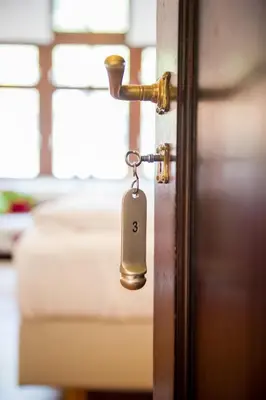 Ein Bett oder Betten in einem Zimmer der Unterkunft Hotel Villa Vinum Cochem