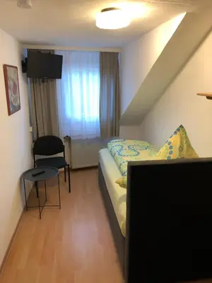 Ein Bett oder Betten in einem Zimmer der Unterkunft Gästehaus Ziemons