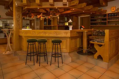 Lounge oder Bar in der Unterkunft Hotel Merle