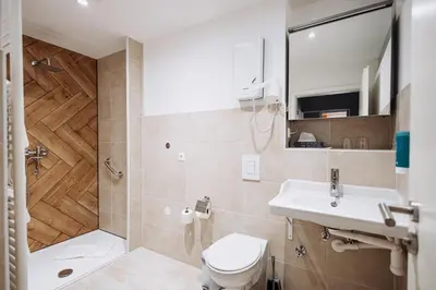 Ein Badezimmer in der Unterkunft Hotel Kleiner Riesen