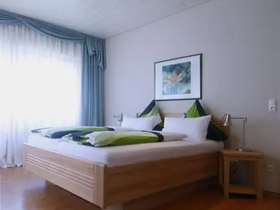Ein Bett oder Betten in einem Zimmer der Unterkunft Ferienwohnungen Bach