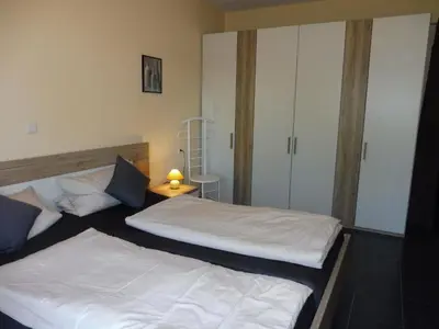 Ein Bett oder Betten in einem Zimmer der Unterkunft Die Ferienwohnungen Dominik , Fill
