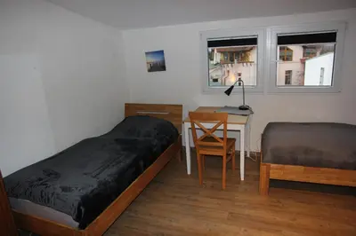 Ein Bett oder Betten in einem Zimmer der Unterkunft Ferienwohnung Eport